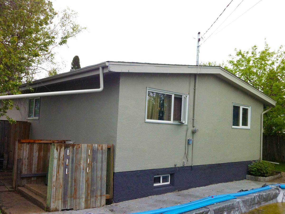 After (Stucco repaired & coated)